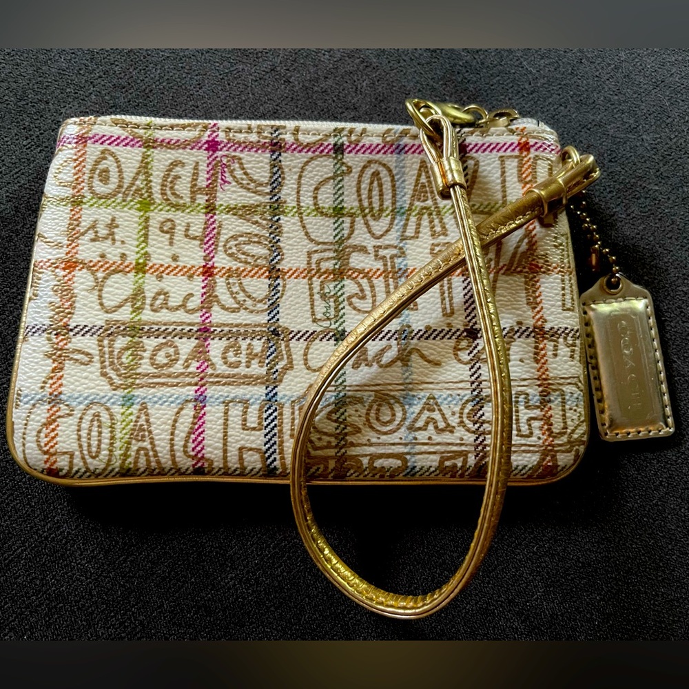 Discontinued Graffiti style Coach wristlet
